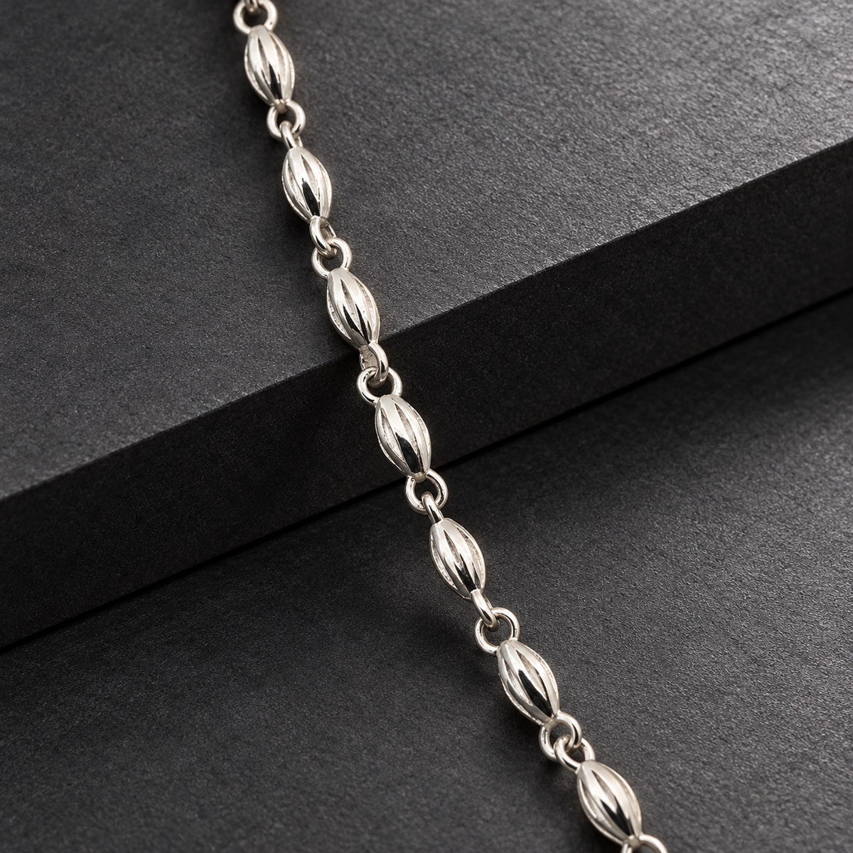 Sterling Silver Fluted Oval Bead Link Chain Necklace with Lobster Clasp product image 2 [product-intake-media:f5c4b3fb-f272-4c3f-a727-cae50d55a038]