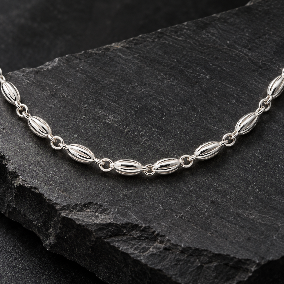 Sterling Silver Fluted Oval Bead Link Chain Necklace with Lobster Clasp product image 8 [product-intake-media:58c93f45-167a-4224-b97e-726927aceabd]