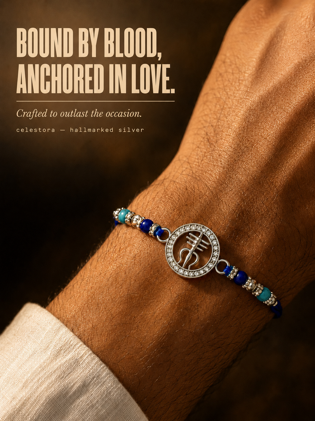Celestora-Silver Trishul with Tripund, CZ stones, and blue spiritual beads Rakhi/Bracelet