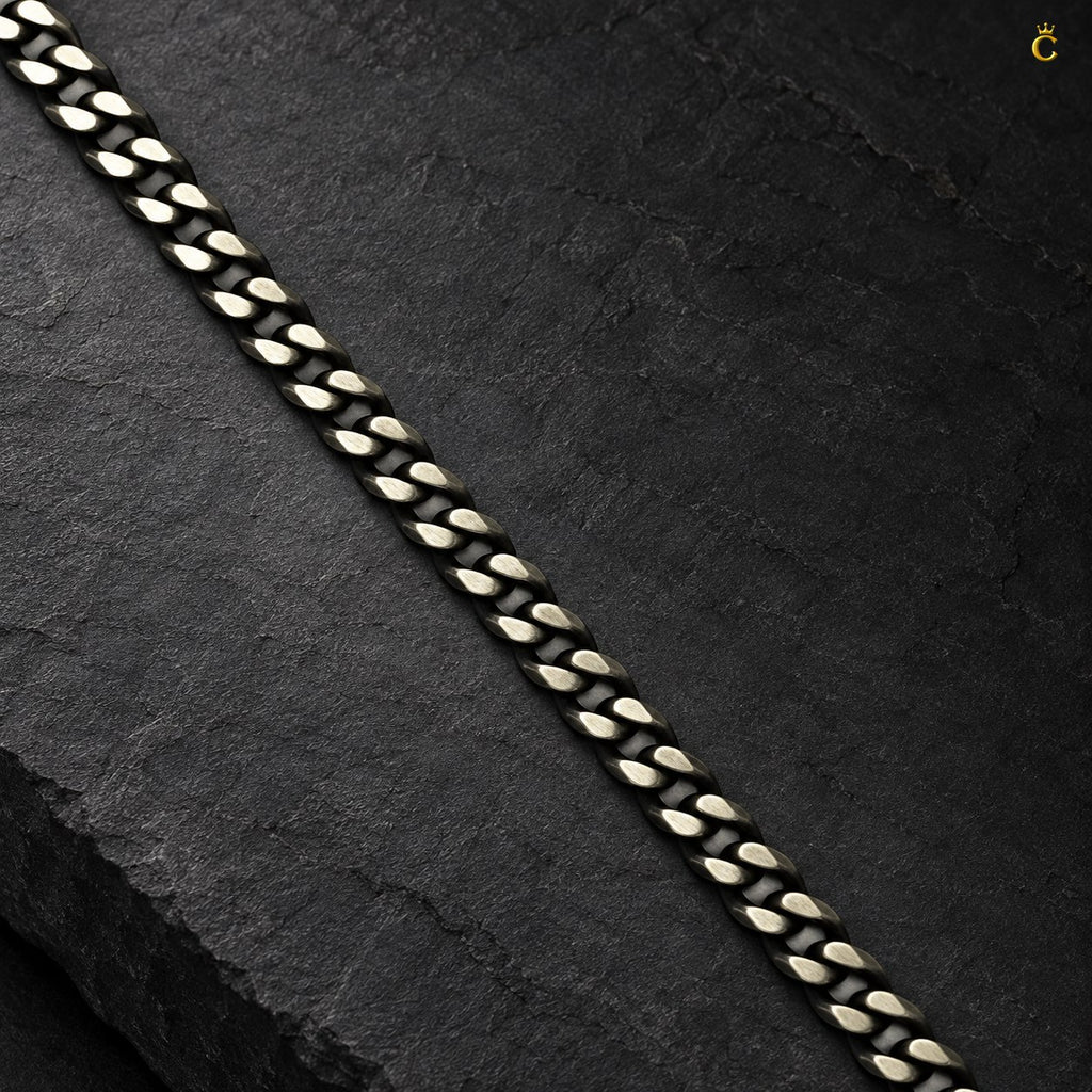Royal Cuban-link style bold oxidized. Silver chain