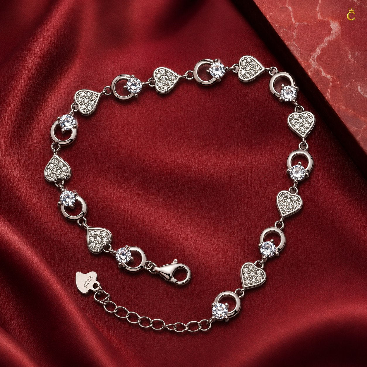 Interlocking Heart and Solitaire Silver Bracelet
