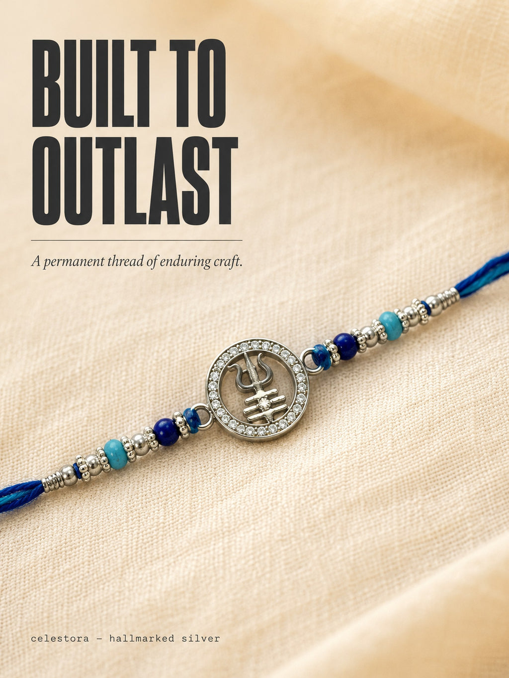 Celestora-Silver Trishul with Tripund, CZ stones, and blue spiritual beads Rakhi/Bracelet