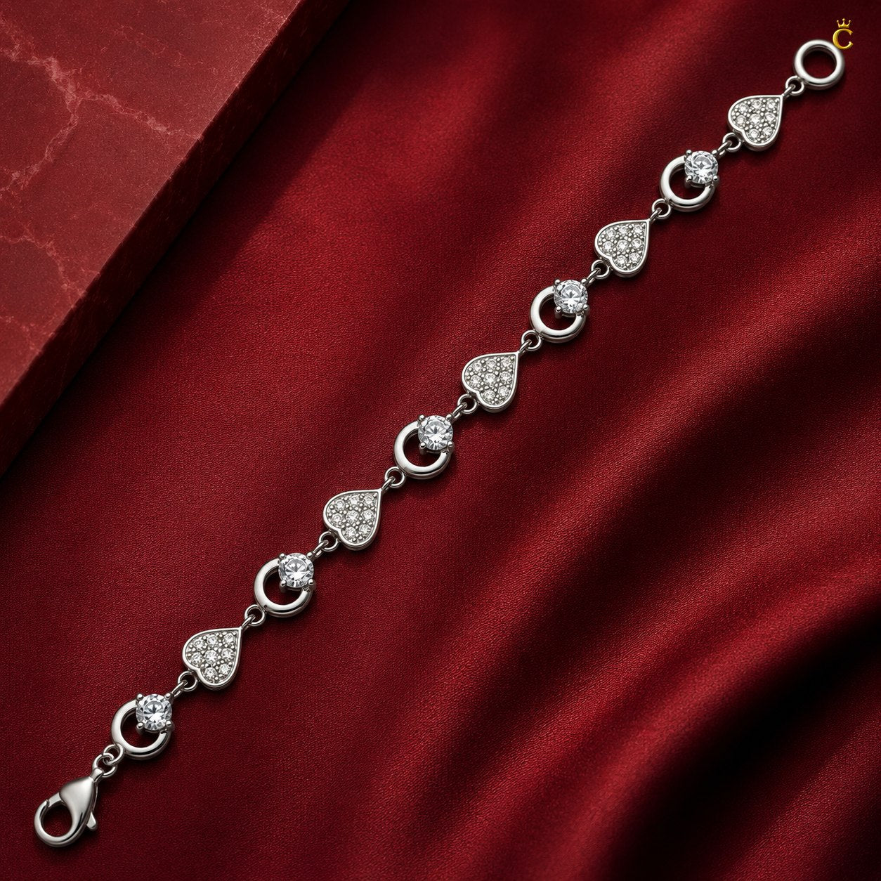 Interlocking Heart and Solitaire Silver Bracelet