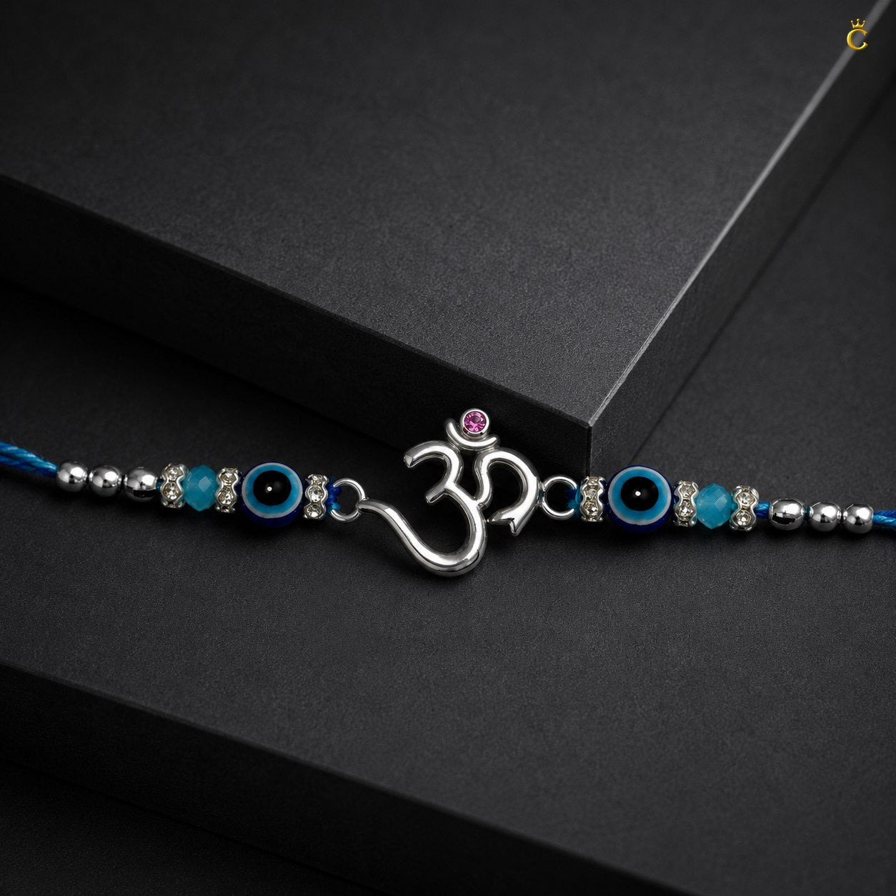 Celestora- Silver Om Evil Eye Premium Rakhi/ Bracelet