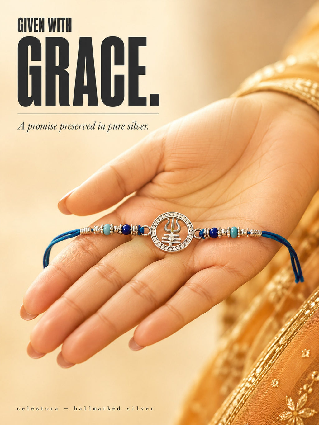 Celestora-Silver Trishul with Tripund, CZ stones, and blue spiritual beads Rakhi/Bracelet