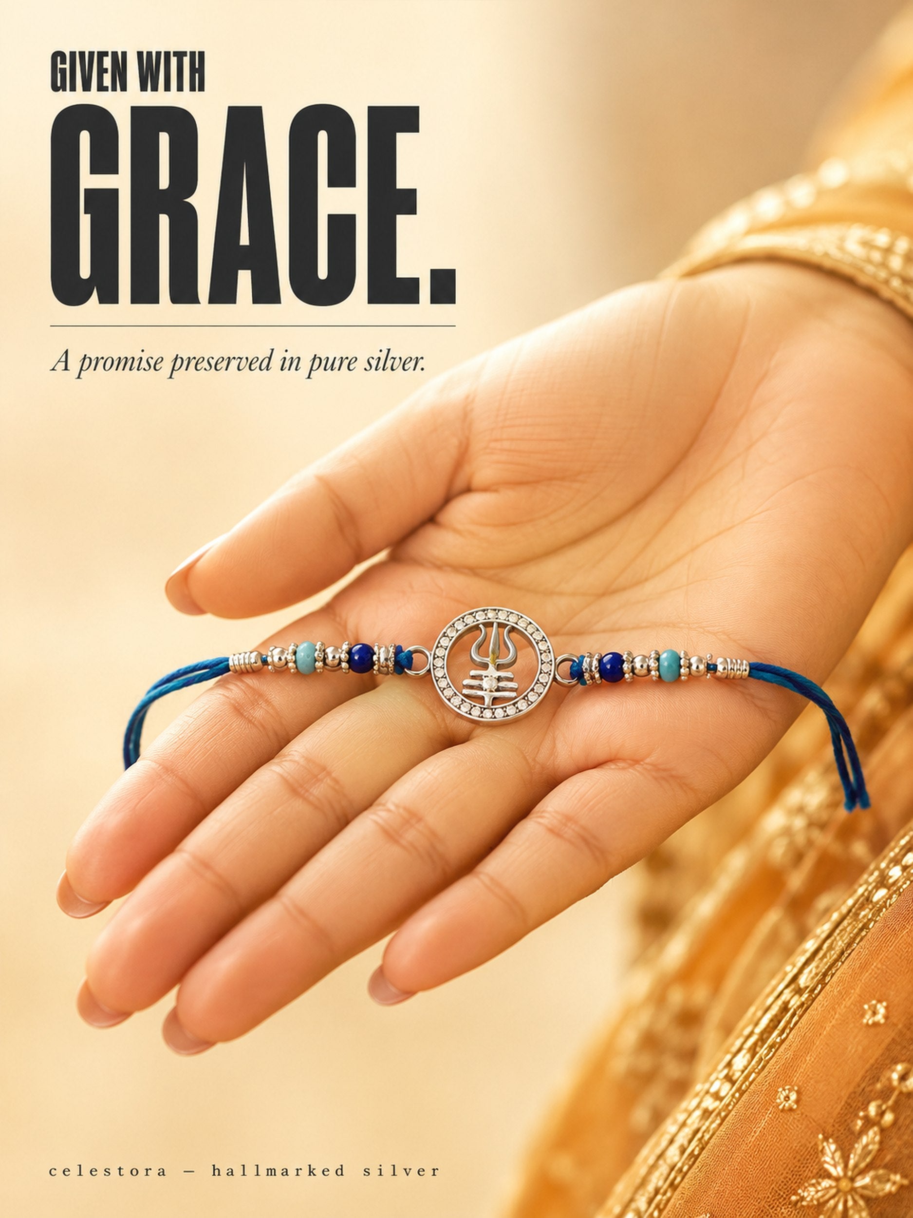 Celestora-Silver Trishul with Tripund, CZ stones, and blue spiritual beads Rakhi/Bracelet