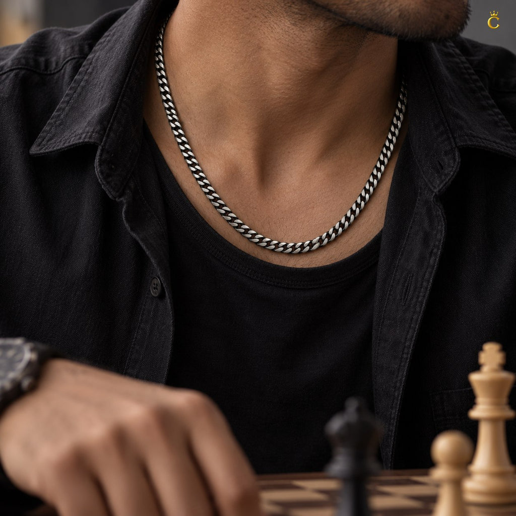 Royal Cuban-link style bold oxidized. Silver chain