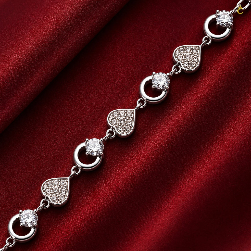 Interlocking Heart and Solitaire Silver Bracelet