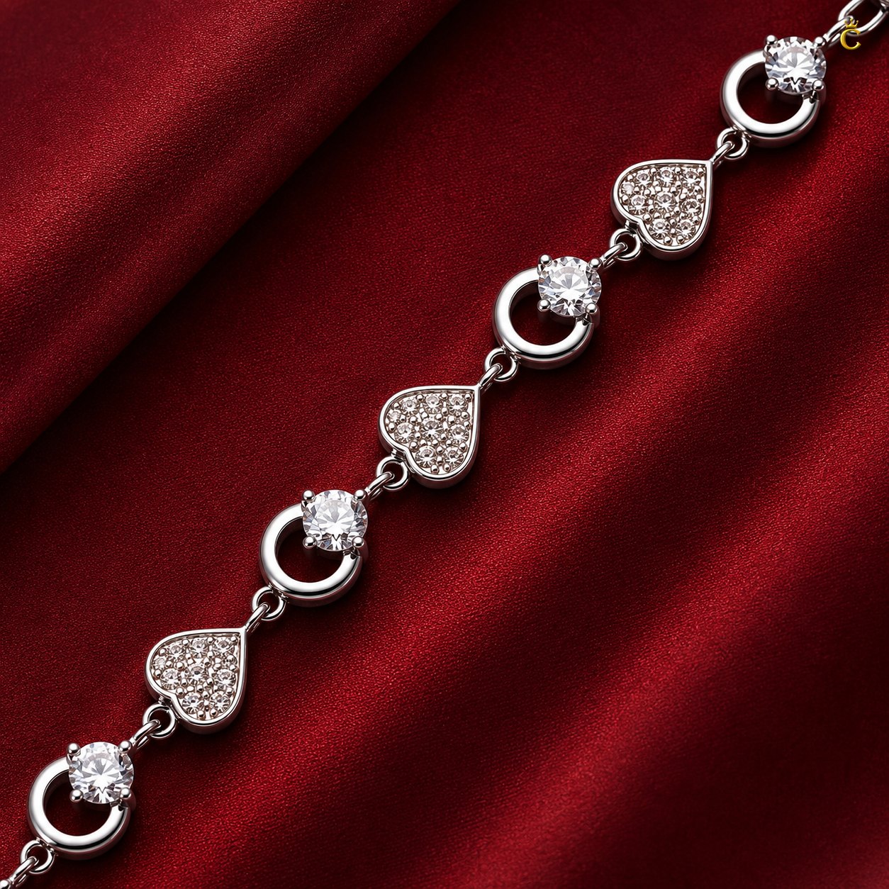 Interlocking Heart and Solitaire Silver Bracelet