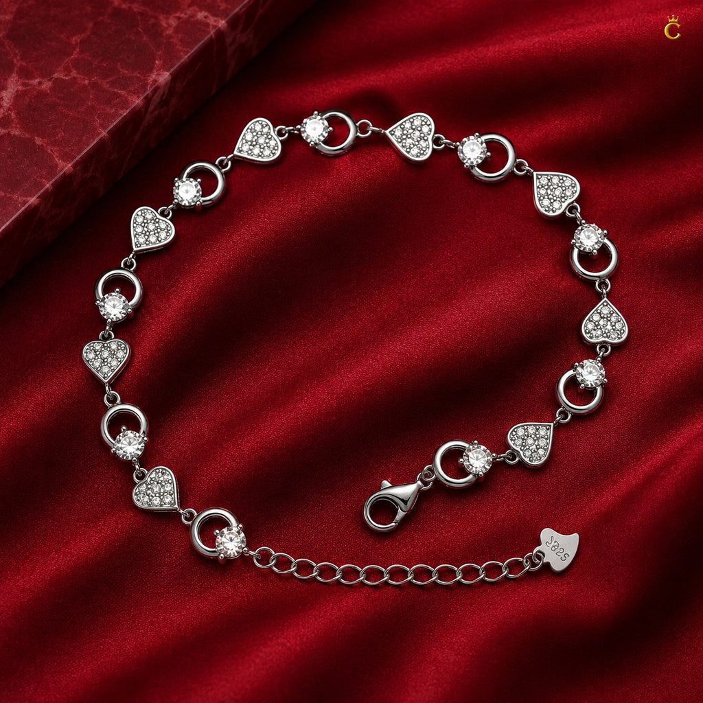 Interlocking Heart and Solitaire Silver Bracelet
