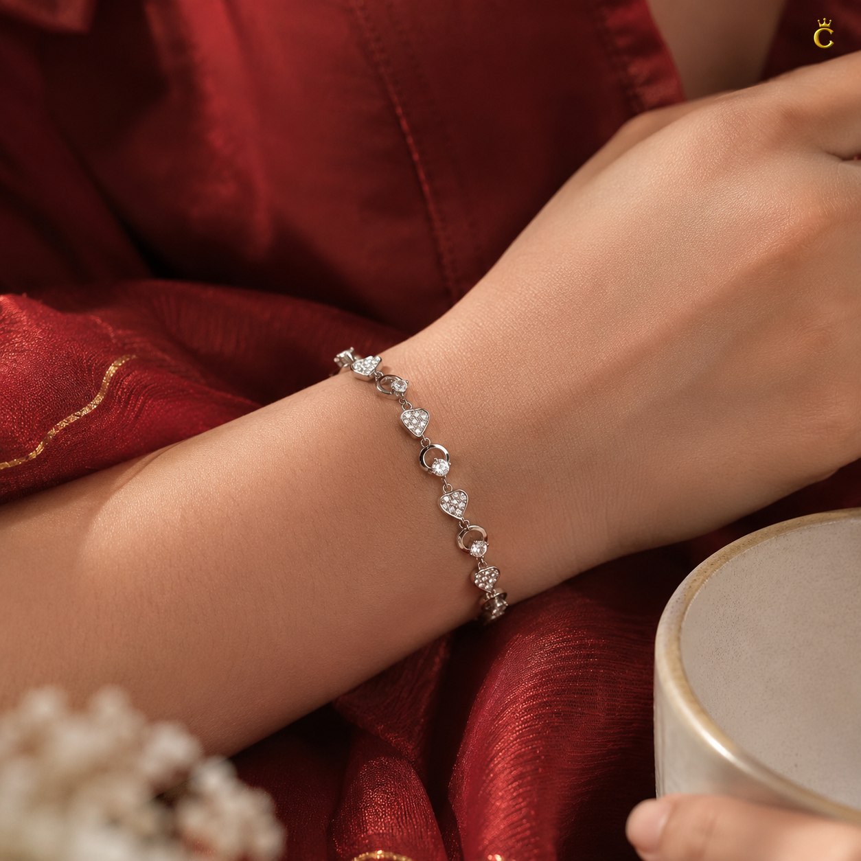 Interlocking Heart and Solitaire Silver Bracelet