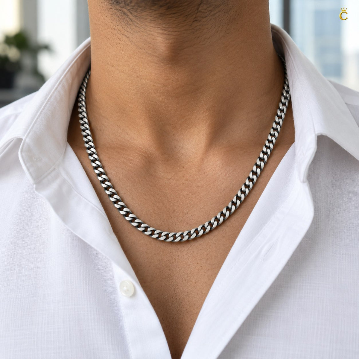 Royal Cuban-link style bold oxidized. Silver chain