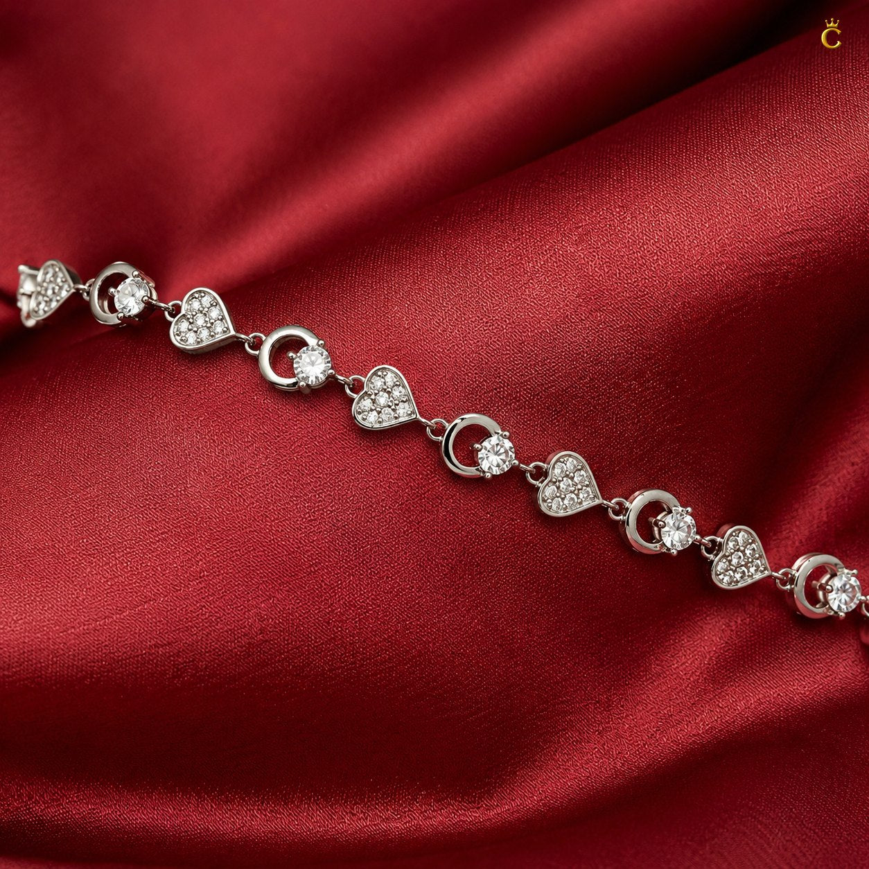 Interlocking Heart and Solitaire Silver Bracelet