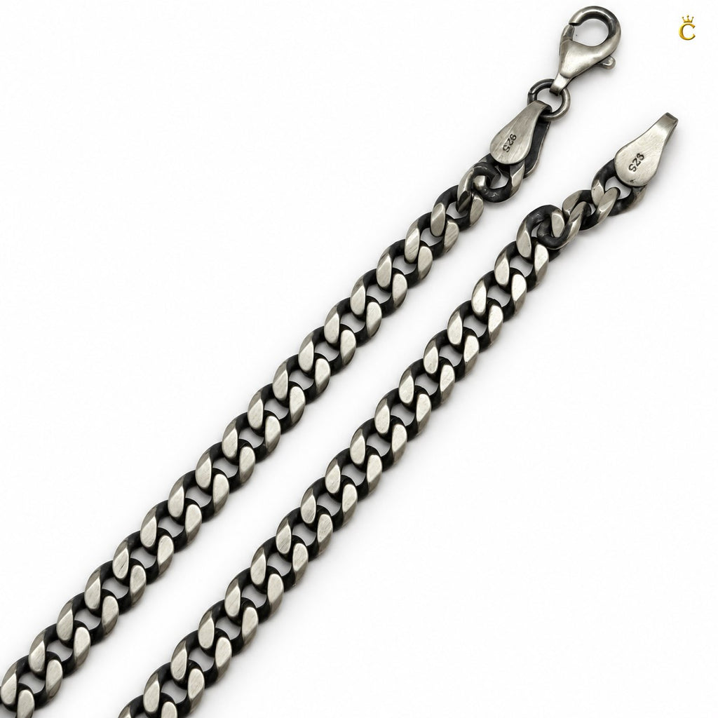 Royal Cuban-link style bold oxidized. Silver chain