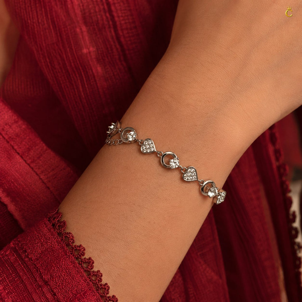 Interlocking Heart and Solitaire Silver Bracelet