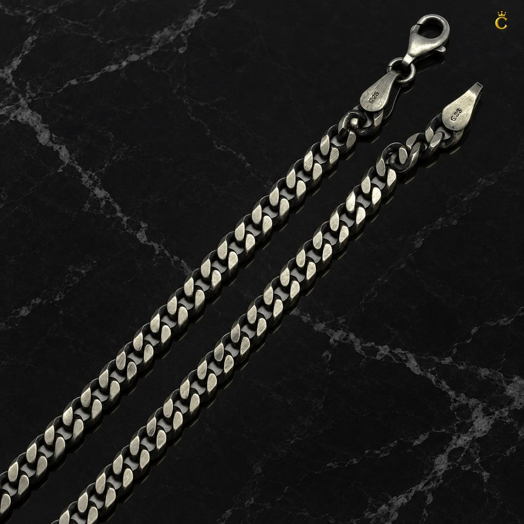 Royal Cuban-link style bold oxidized. Silver chain