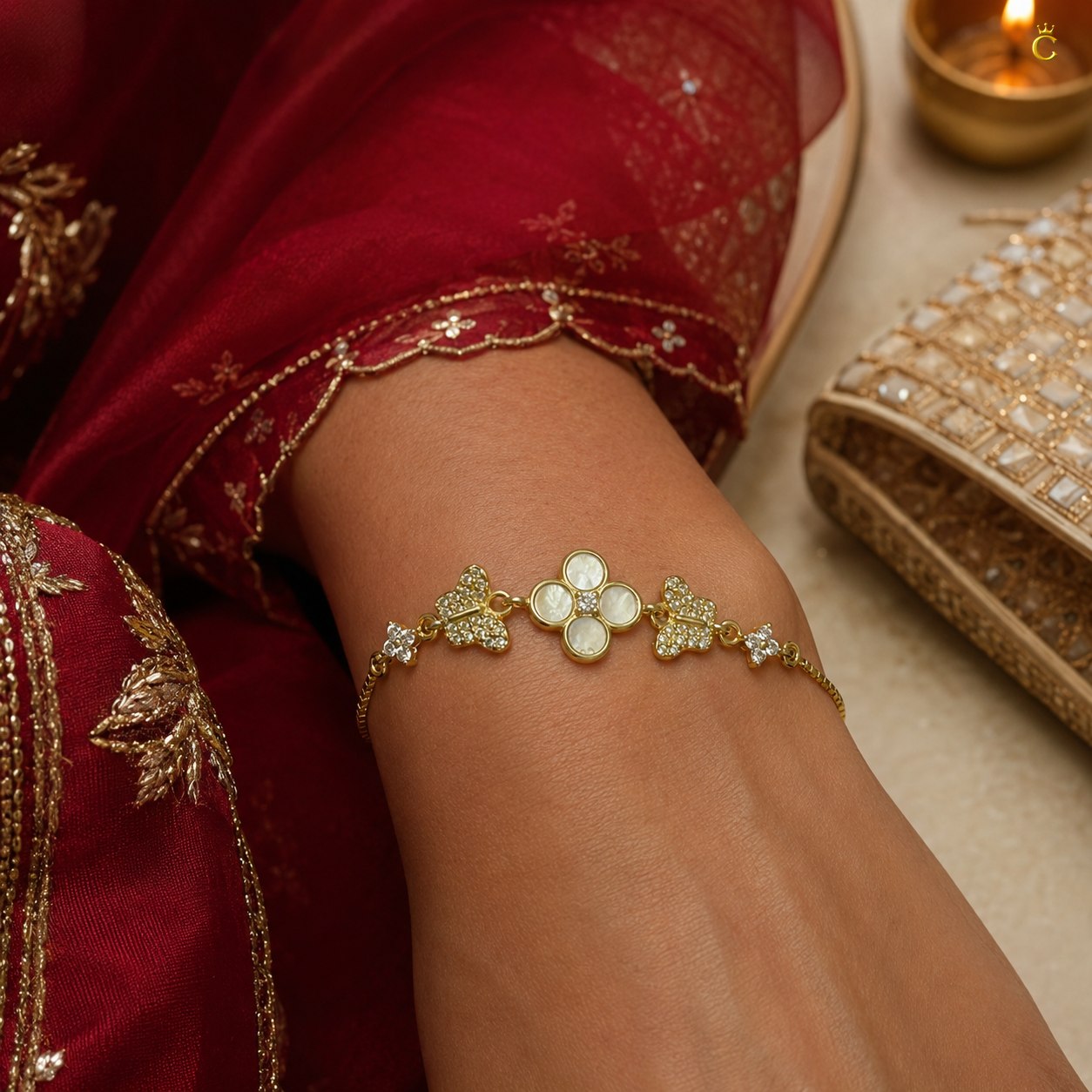 Gold Plated Silver Clover and Butterfly Charm Bracelet