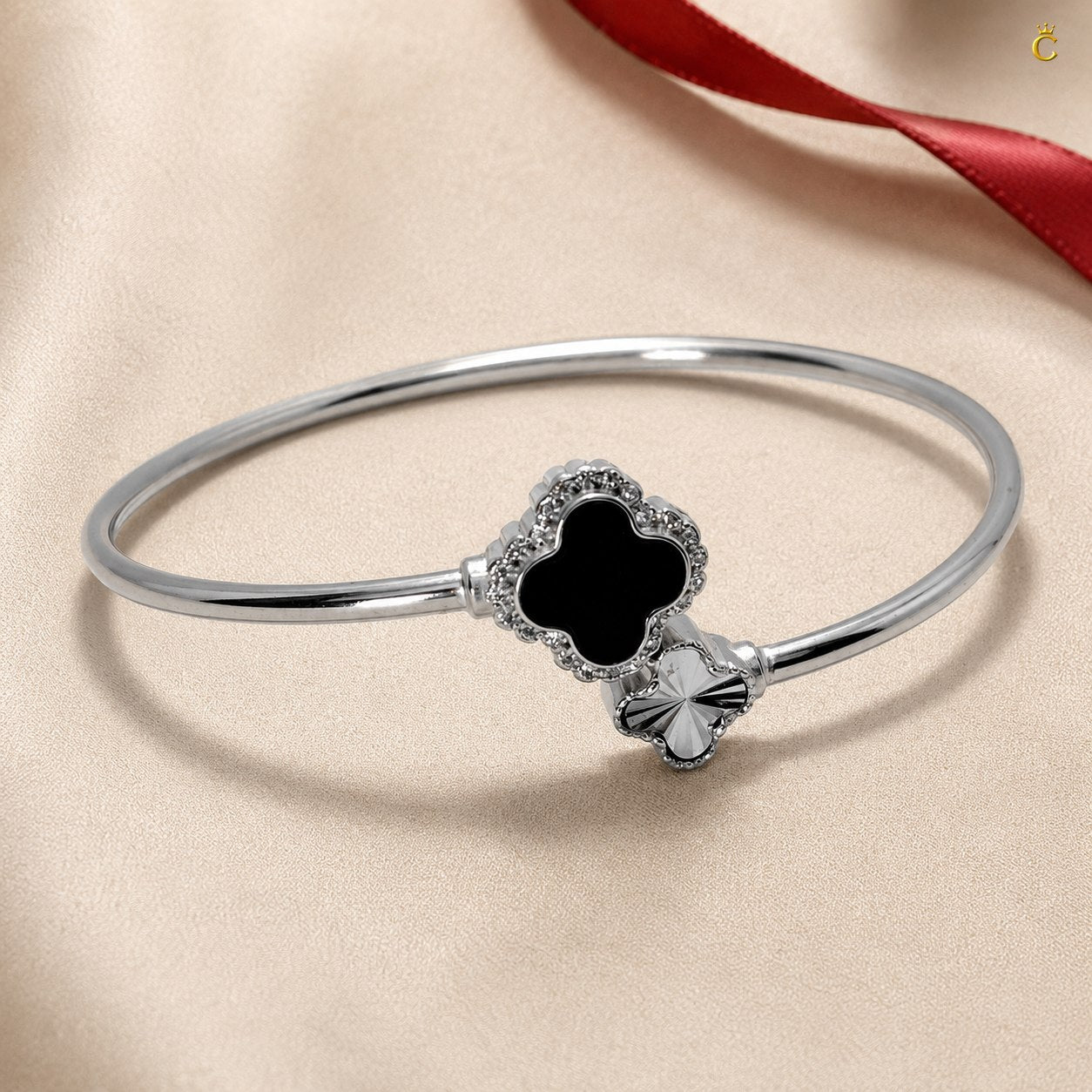 Celestora-Silver Open Cuff/Kada with a Black & Silver clover motif Vancliff design